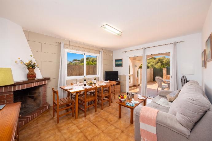 Living room with sofa, dining area, ornamental fireplace, WiFi internet, and satellite TV . - Villa Ponent . (Photo Gallery) }}