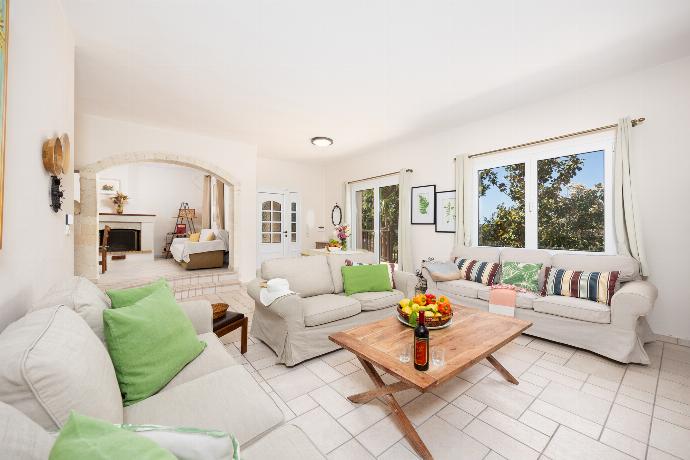 Living room with sofas, A/C, WiFi internet, and satellite TV . - Villa Korini . (Photo Gallery) }}