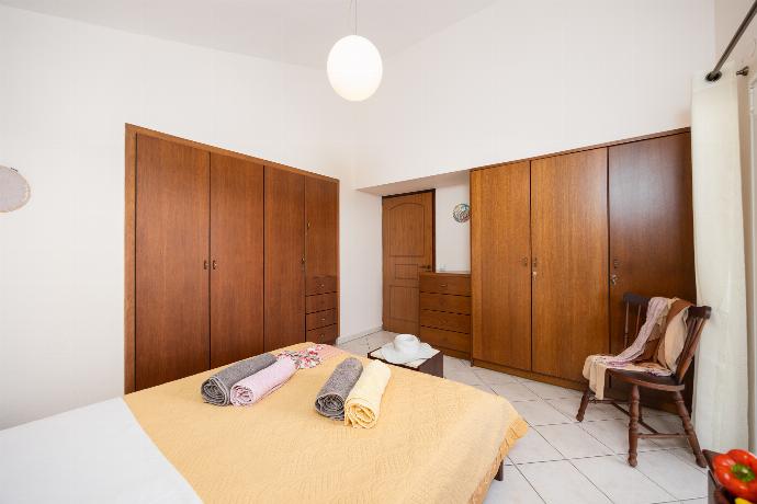 Double bedroom with A/C . - Villa Korini . (Photo Gallery) }}