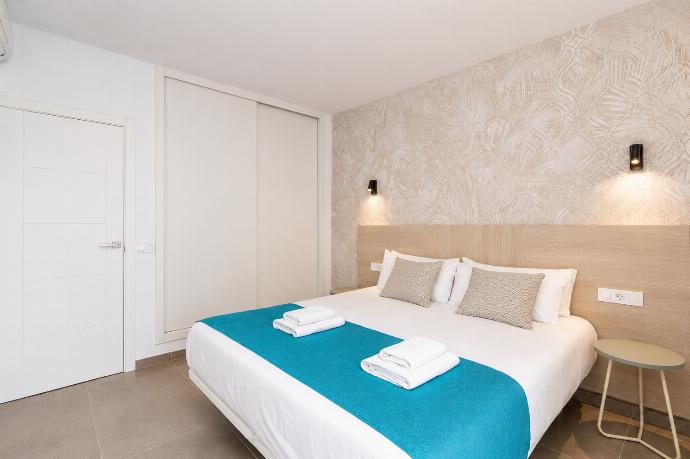 Bright modern bedroom with a comfortable double bed. . - Ereza Residence 2.1 . (Photo Gallery) }}