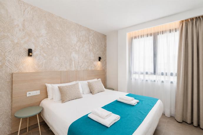Double bedroom with A/C . - Ereza Residence 2.4 . (Photo Gallery) }}