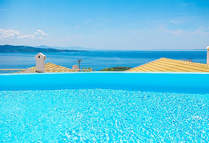 ,Private infinity pool and terrace with sea views . - Villa Frosso . (Photo Gallery) }}