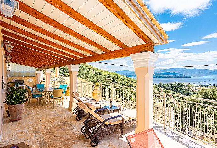 Sheltered terrace area with sea views . - Villa Frosso . (Photo Gallery) }}