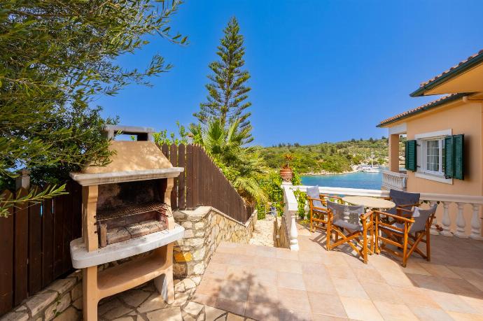 Terrace area with BBQ . - Dolphin House . (Photo Gallery) }}
