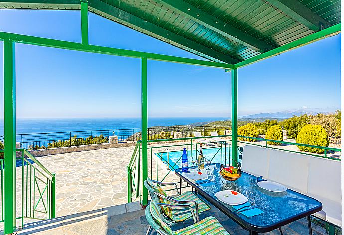 Sheltered terrace area with panoramic sea views . - Villa Valio . (Photo Gallery) }}