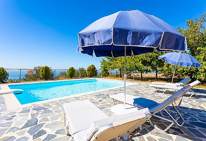 Private pool, terrace, and garden with panoramic sea views . - Villa Aetos . (Galería de imágenes) }}