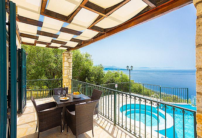 Sheltered terrace area with panoramic sea views . - Villa Magda . (Photo Gallery) }}