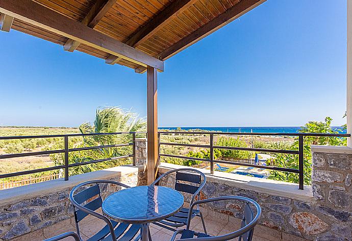 Balcony with sea views . - Spiros Beach Villa . (Photo Gallery) }}