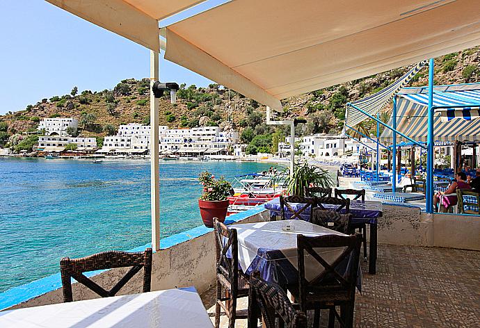 Seafront Taverna/Restaurant . - Spiros Beach Villa . (Galería de imágenes) }}