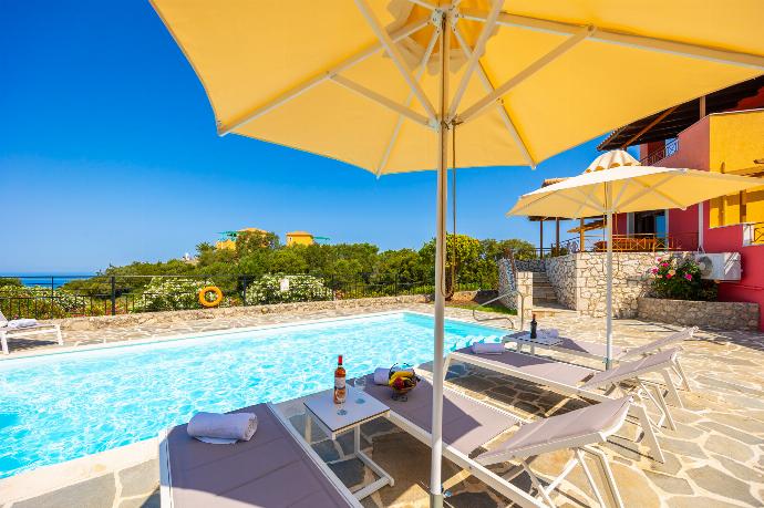 Private pool and terrace with sea views . - Villa Yeraki . (Photo Gallery) }}