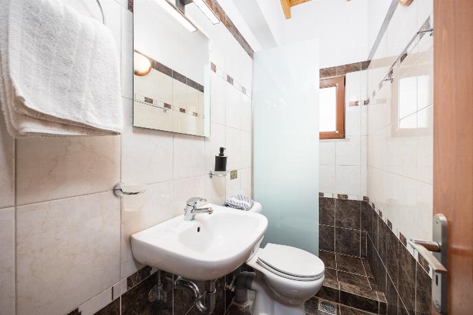 En suite bathroom with shower . - Villa Yeraki . (Photo Gallery) }}