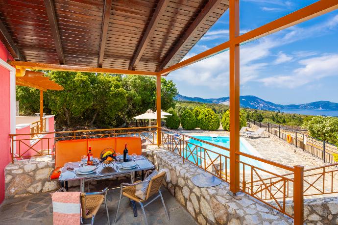 Sheltered terrace area . - Villa Yeraki . (Photo Gallery) }}