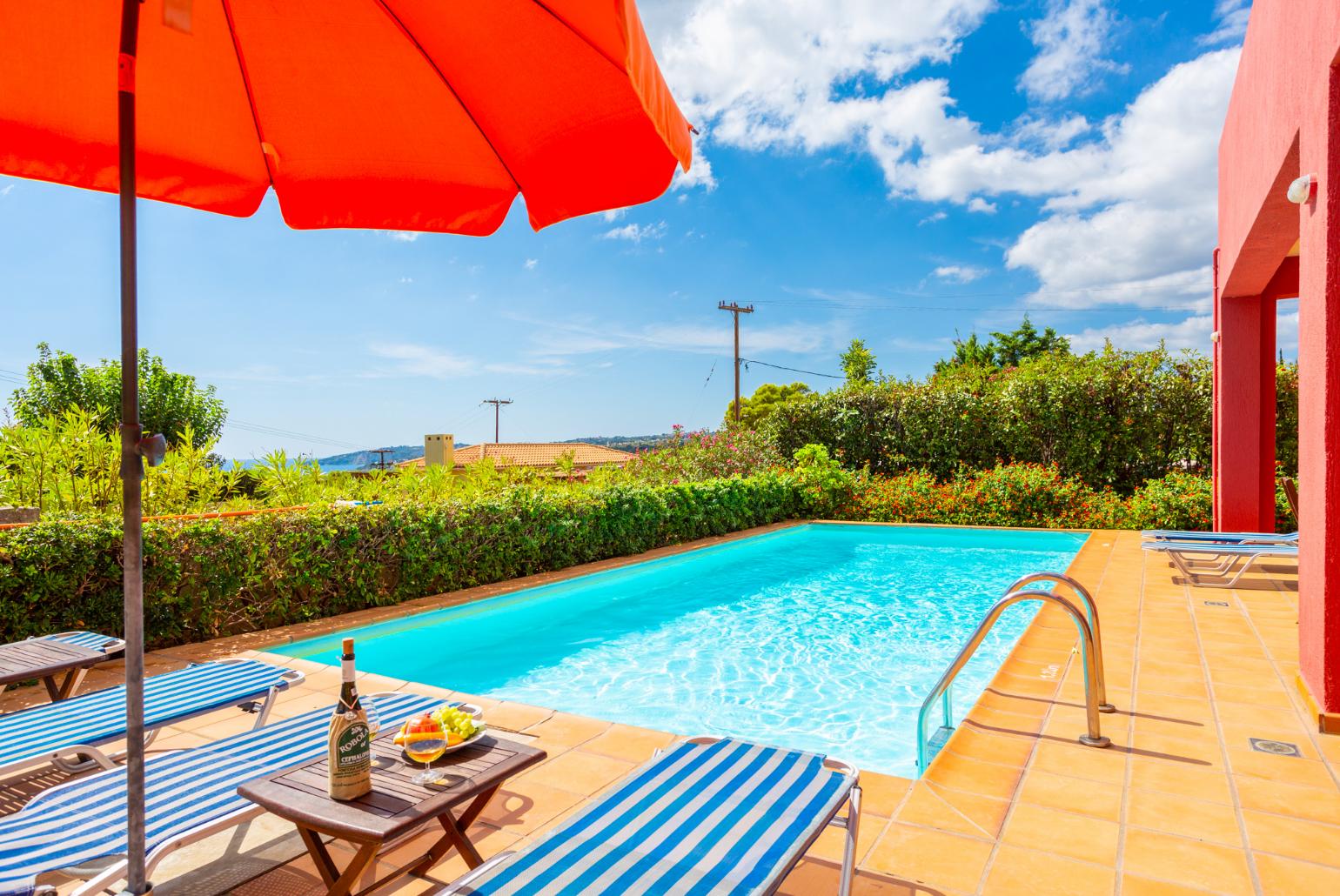 Private pool, terrace, and garden with sea views