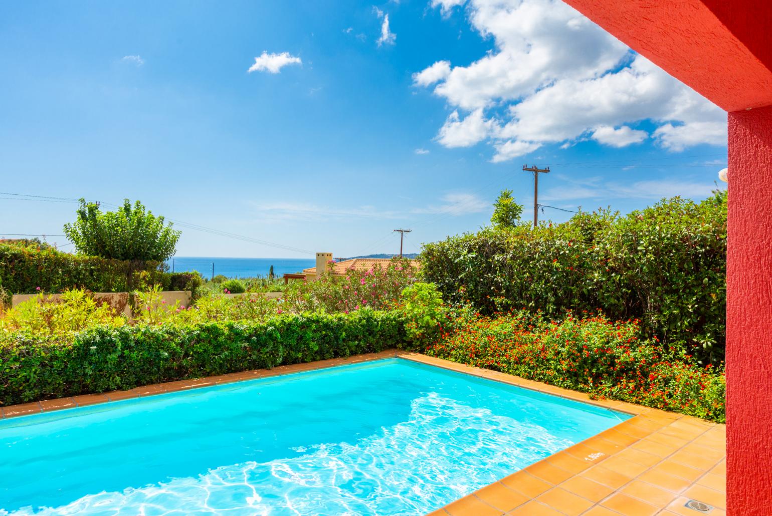 Private pool, terrace, and garden with sea views