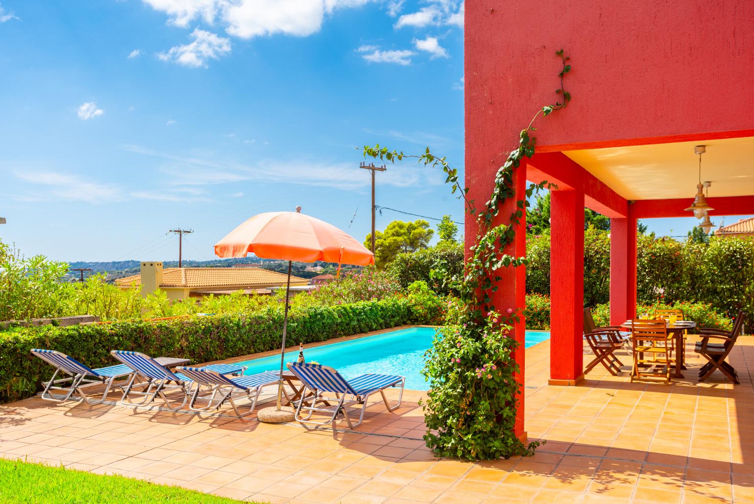 Private pool, terrace, and garden with sea views