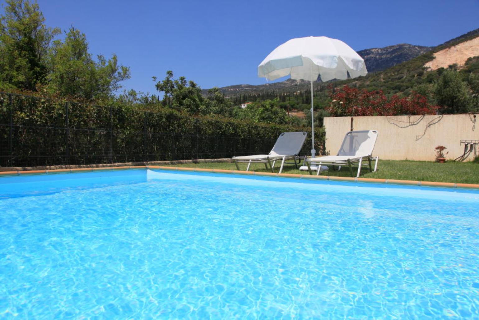 Private pool, terrace, and garden with sea views