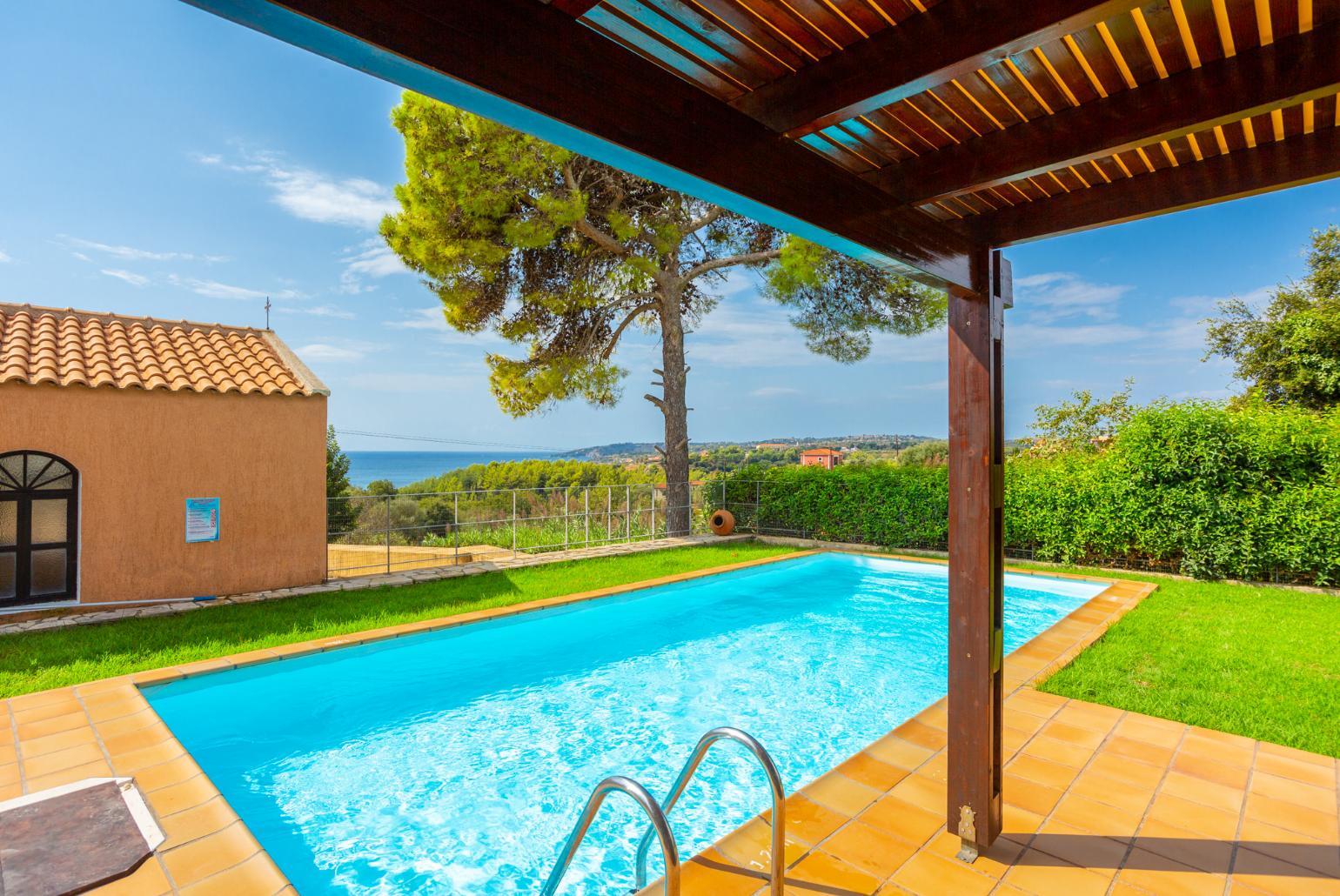 Private pool, terrace, and garden with sea views