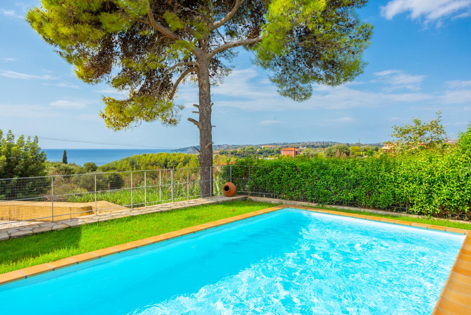 Private pool, terrace, and garden with sea views