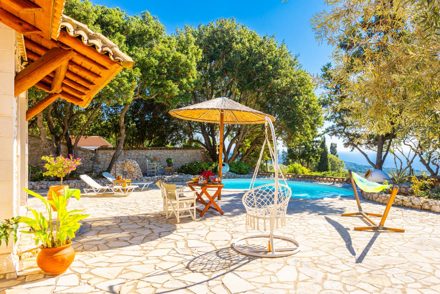 Private pool, terrace, and garden with sea views