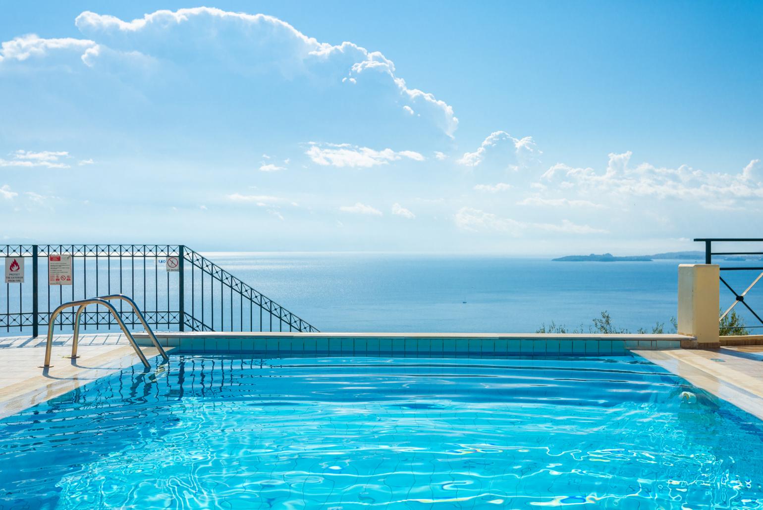 Private infinity pool and terrace with panoramic sea views