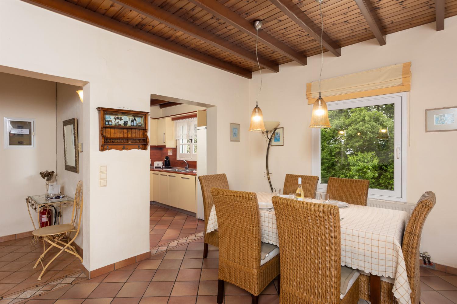 Living room on first floor with sofas, dining area, ornamental fireplace, WiFi internet, satellite TV, and sea views