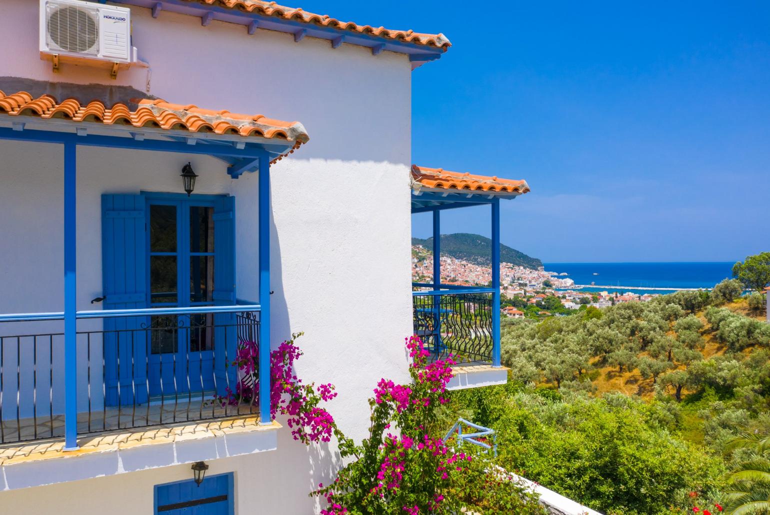 Balconies with panoramic views of sea and Skopelos Town
