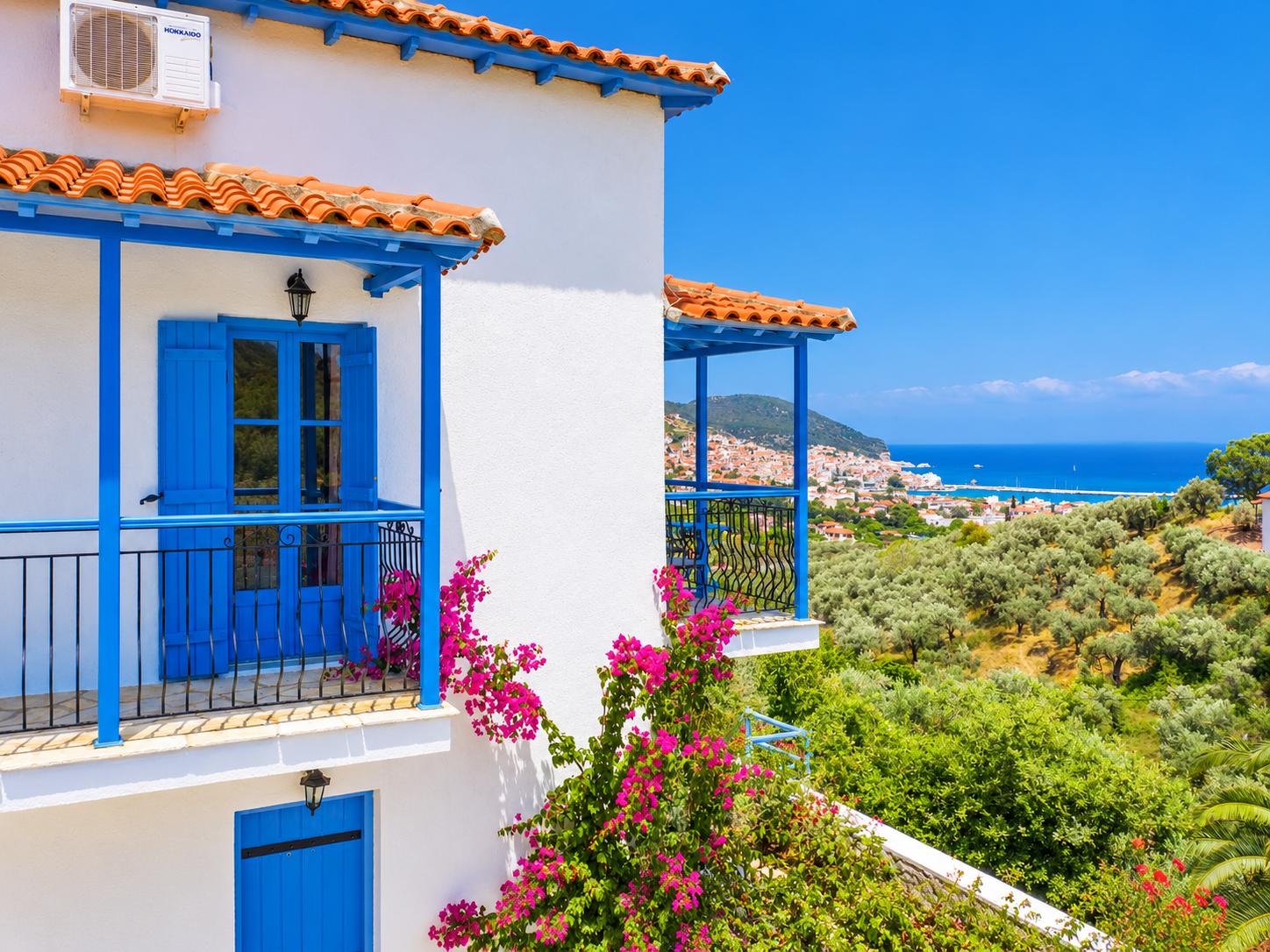Balconies with panoramic views of sea and Skopelos Town