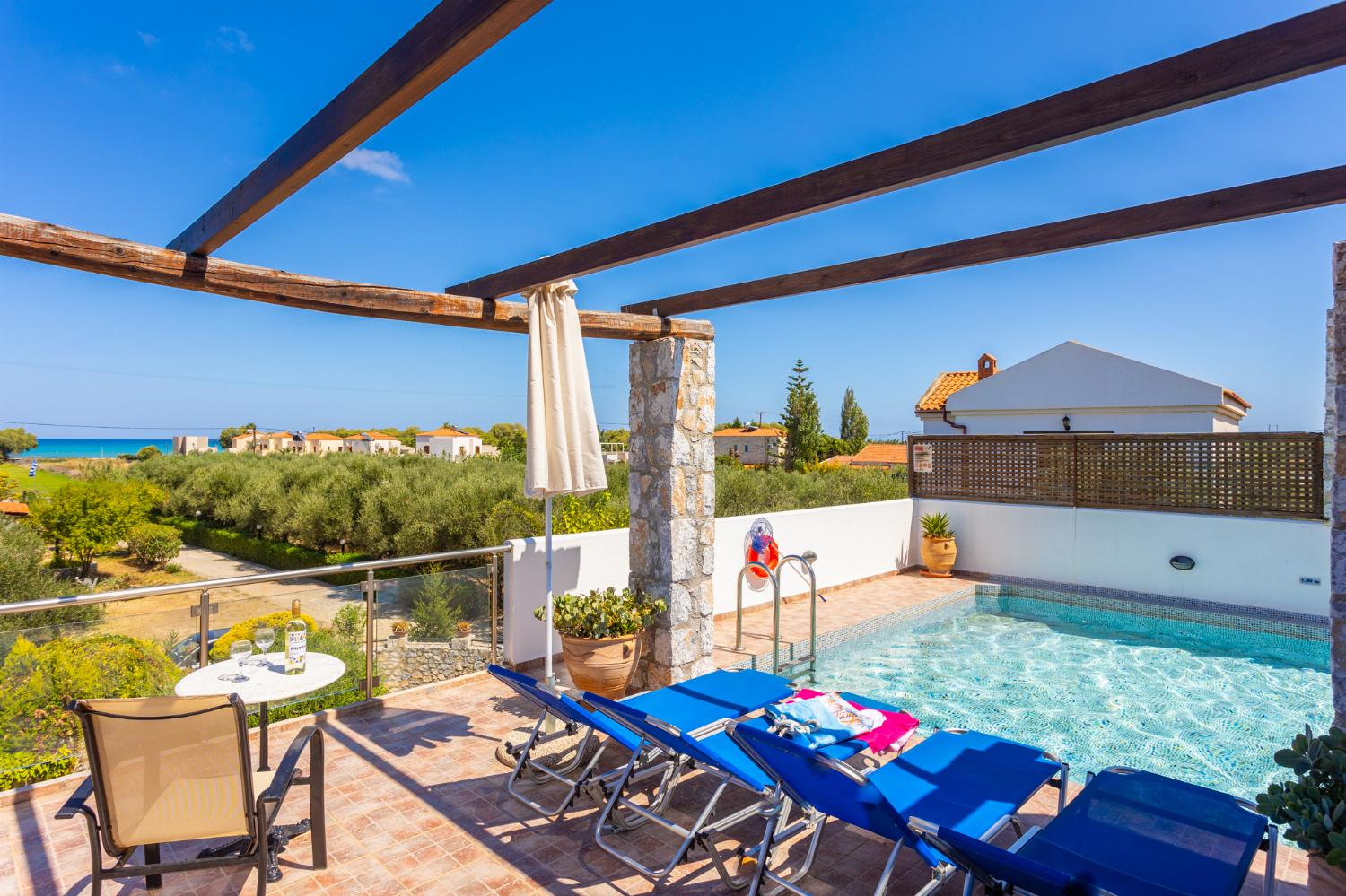 Private pool, garden, and terrace with sea views