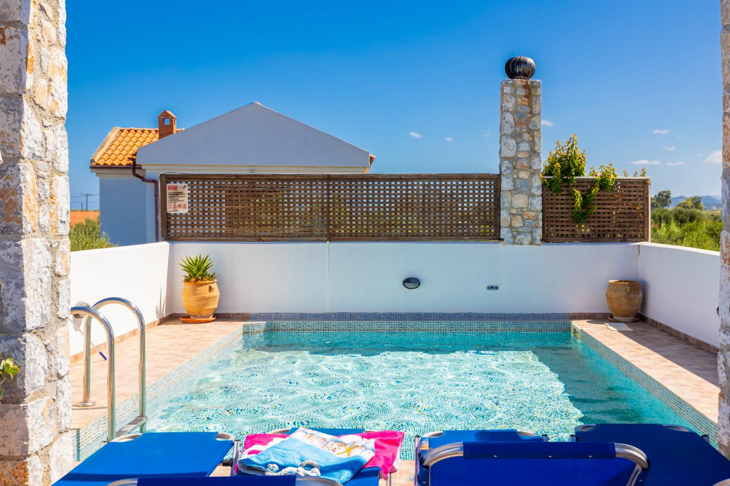 Private pool, garden, and terrace with sea views