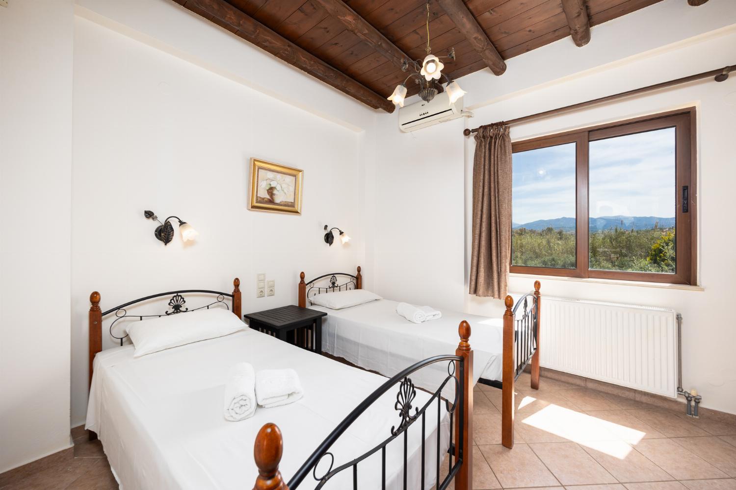 Twin bedroom with A/C