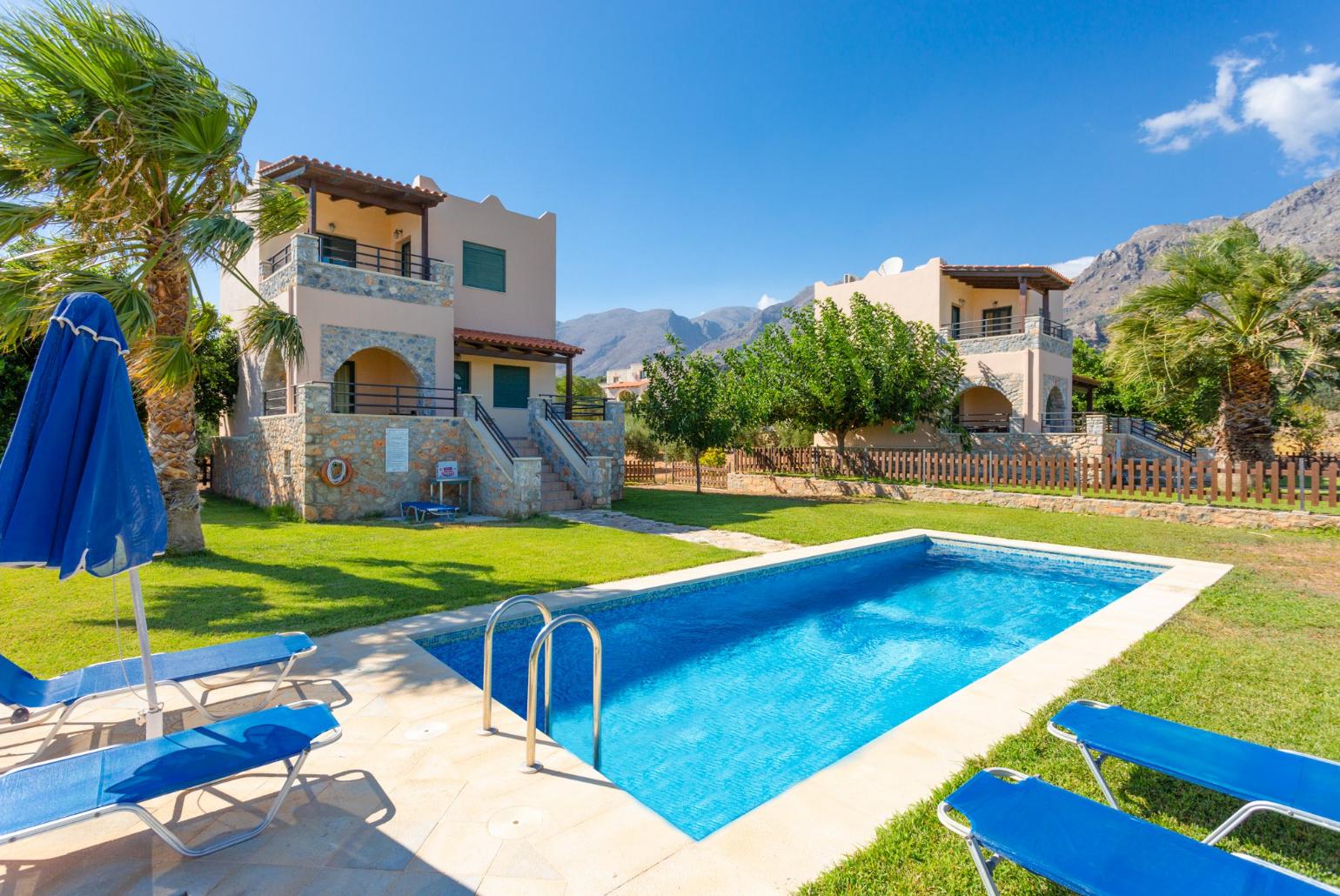 Beautiful villa with private pool, lawn, and terrace with sea views