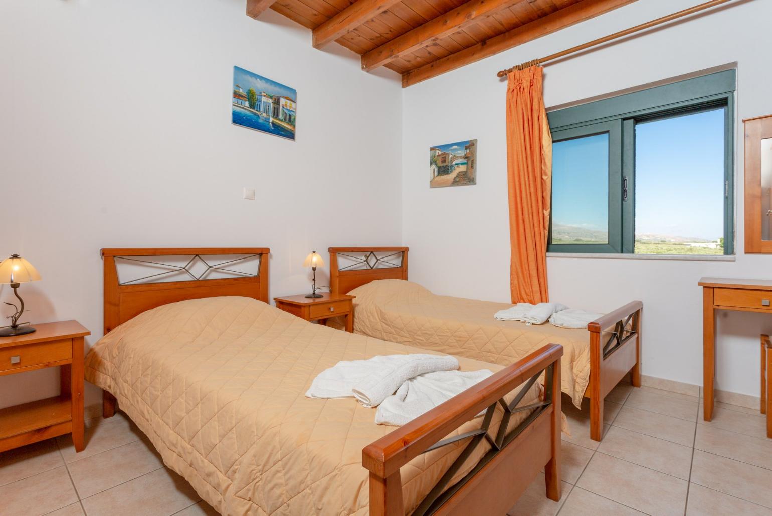 Twin bedroom with A/C and balcony access with sea views