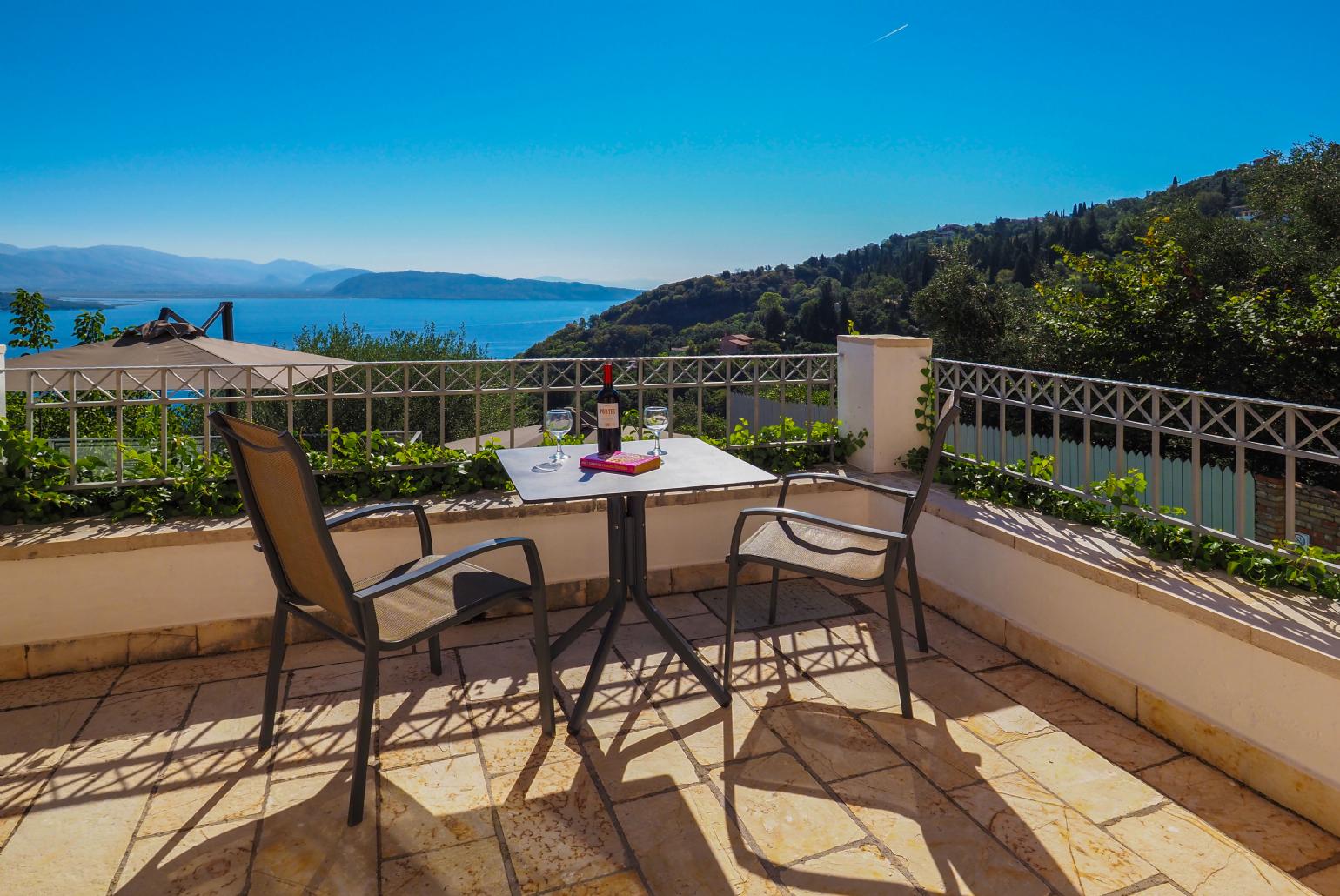 Upper terrace area with panoramic sea views