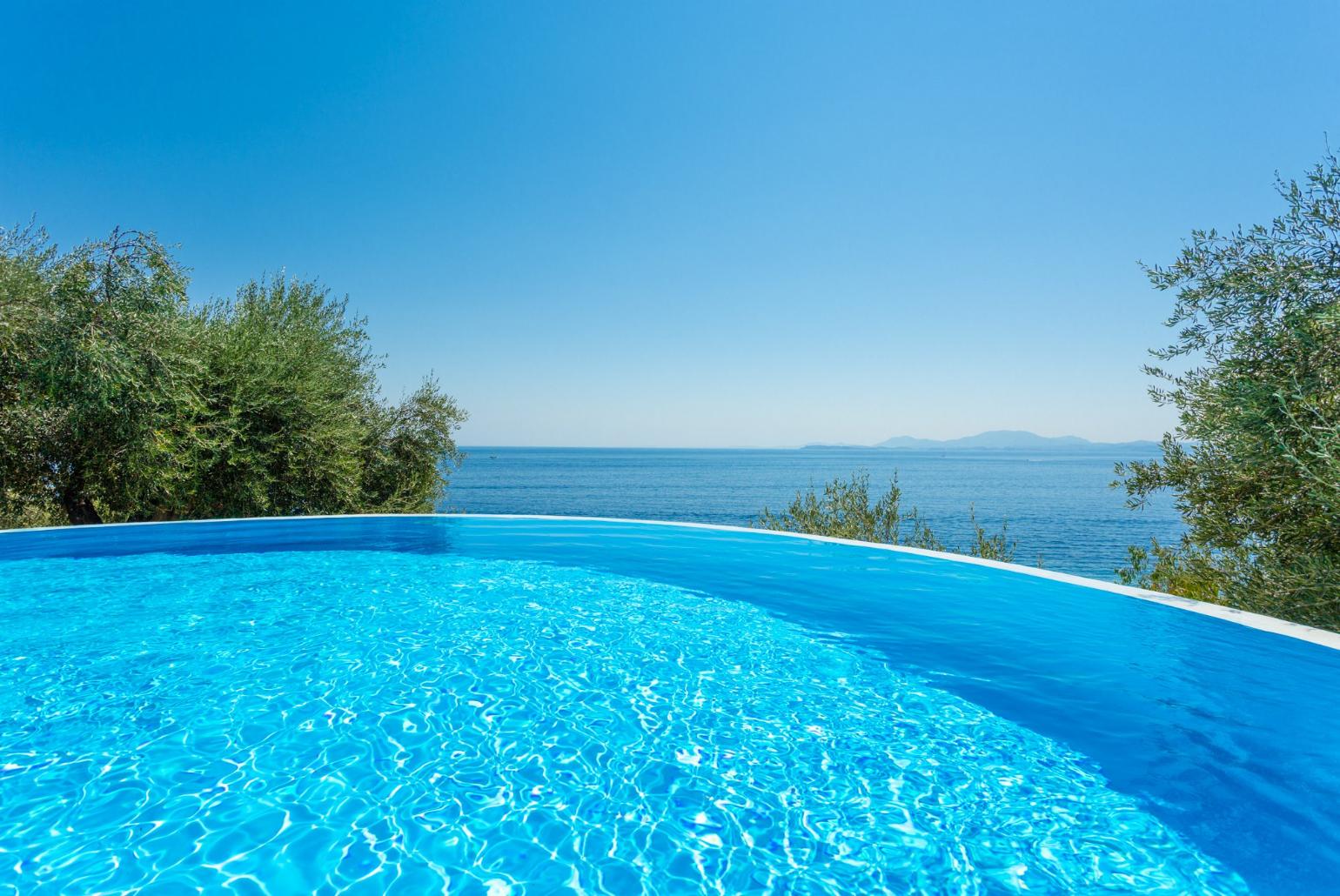 Private infinity pool with panoramic sea views