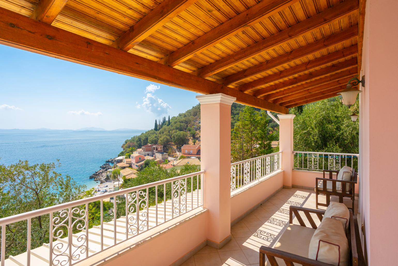 Sheltered upper terrace area with panoramic sea views