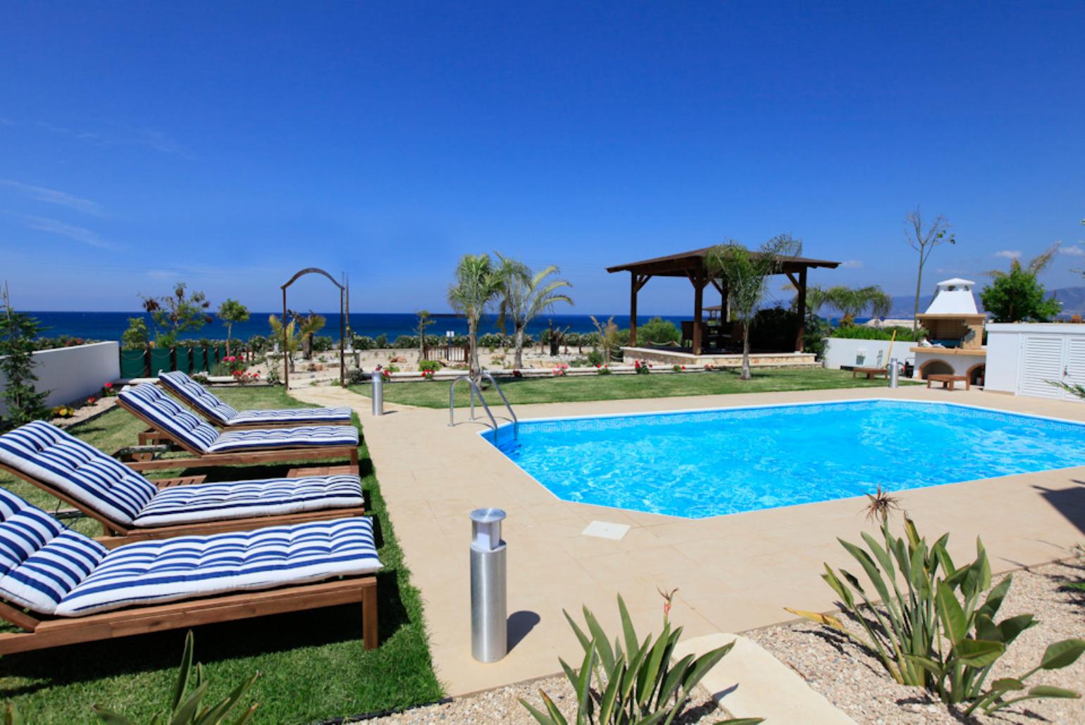 Private swimming pool with sea views