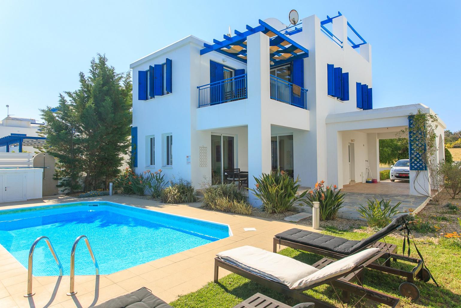 Private swimming pool with terrace and garden area