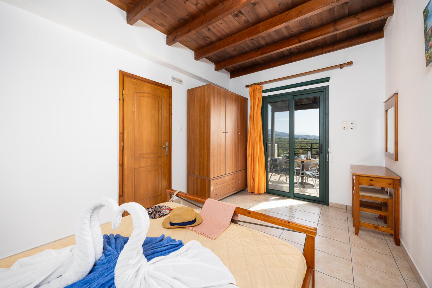 Upper unit: double bedroom with A/C