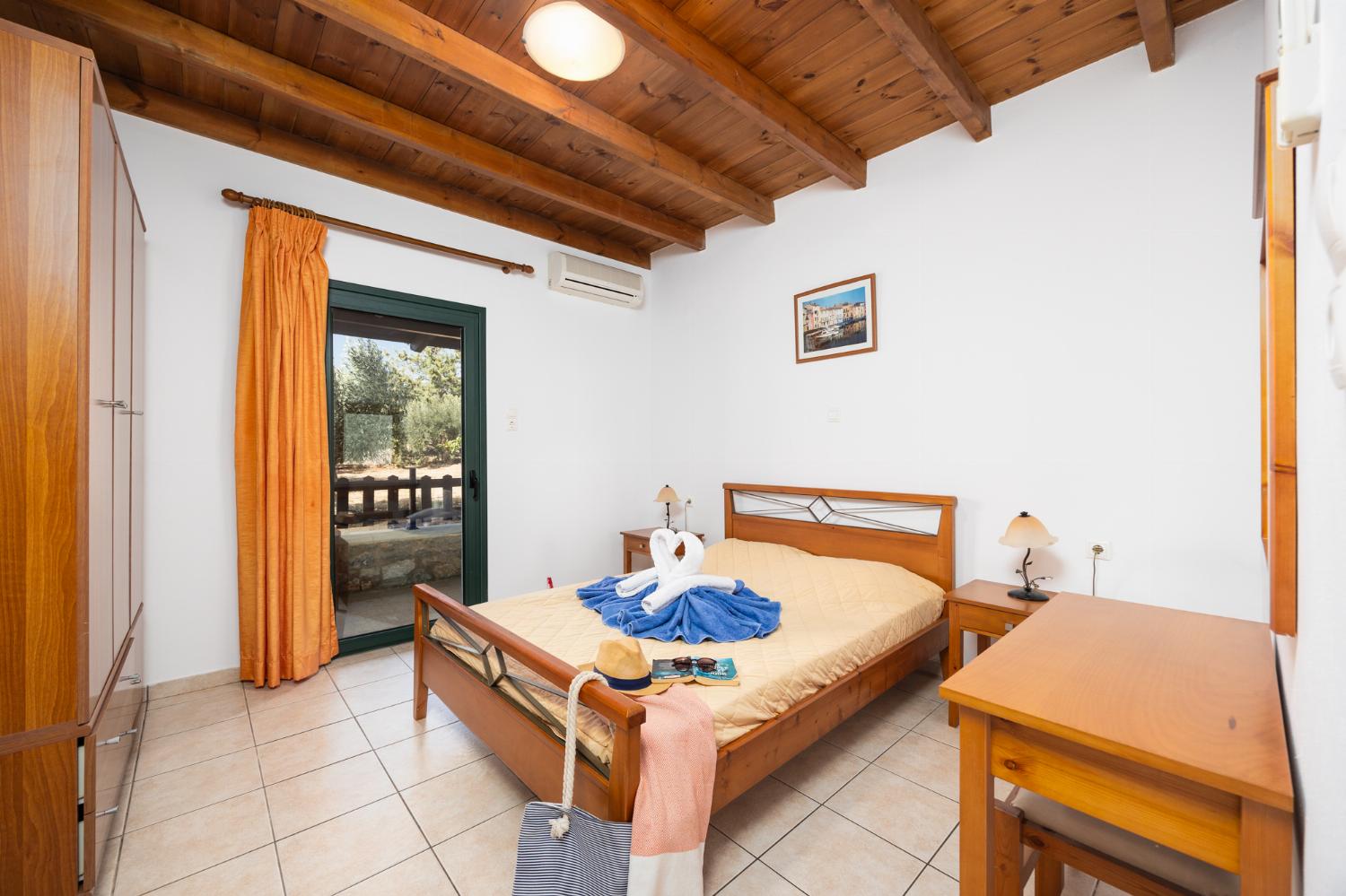 Lower unit: double bedroom with A/C