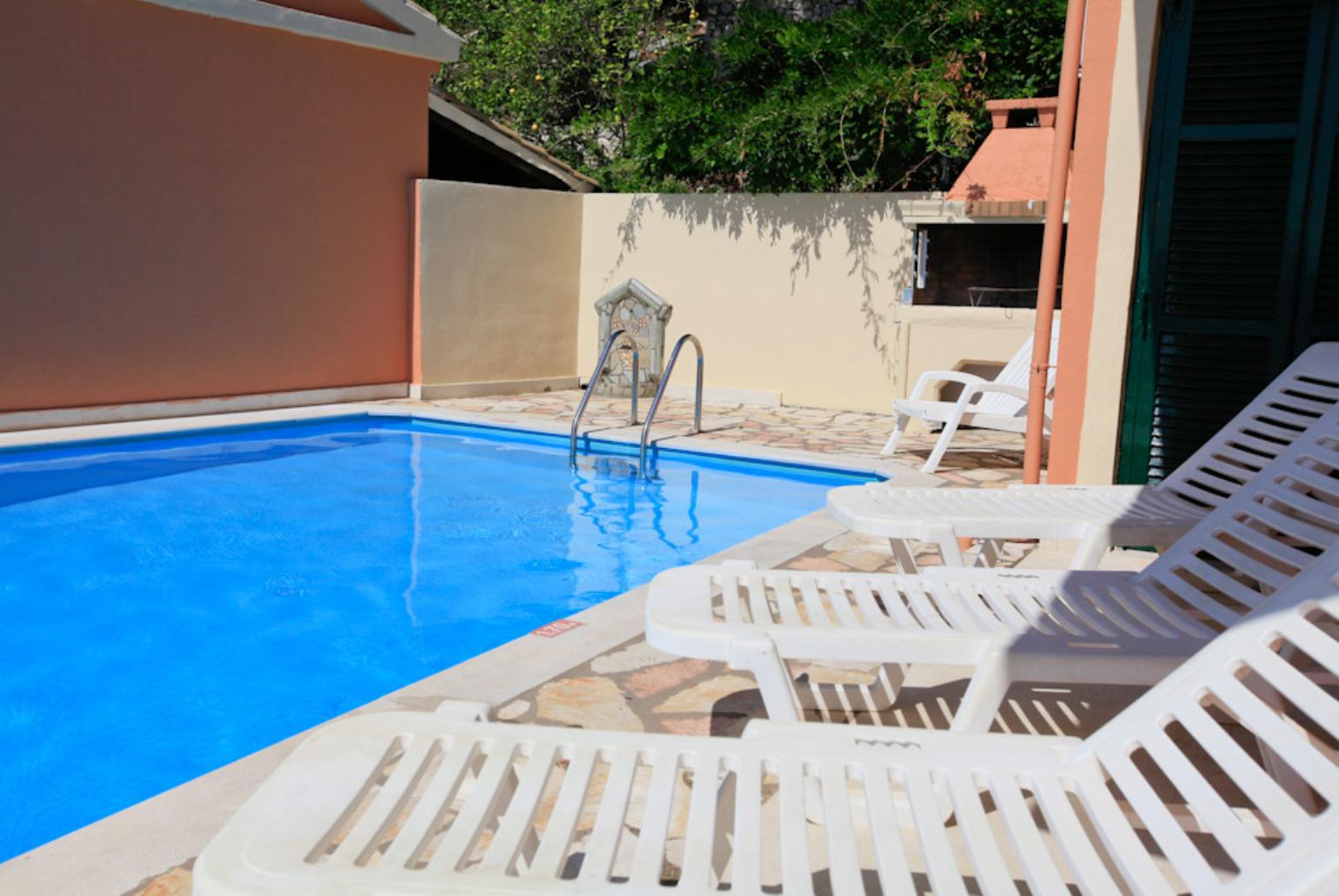 Private pool and terrace area with BBQ