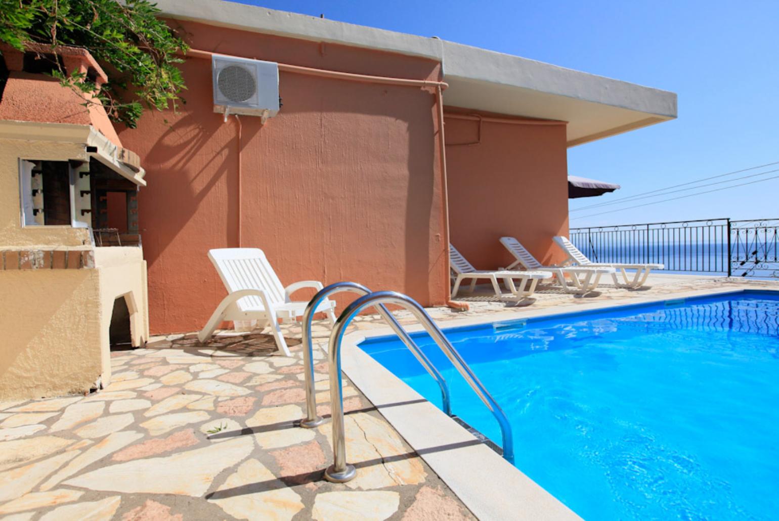 Private pool and terrace area with BBQ
