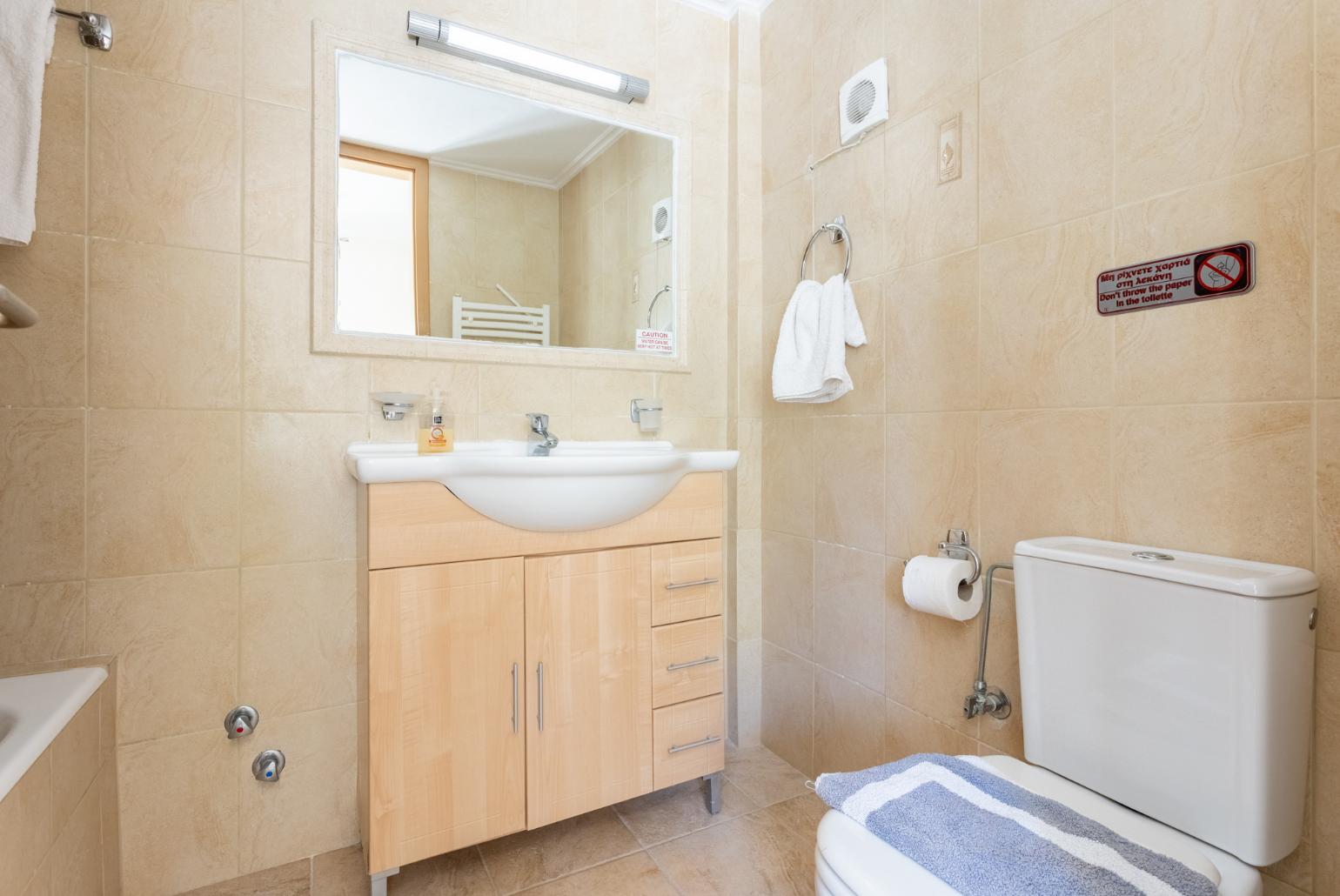 Family bathroom with bath and shower