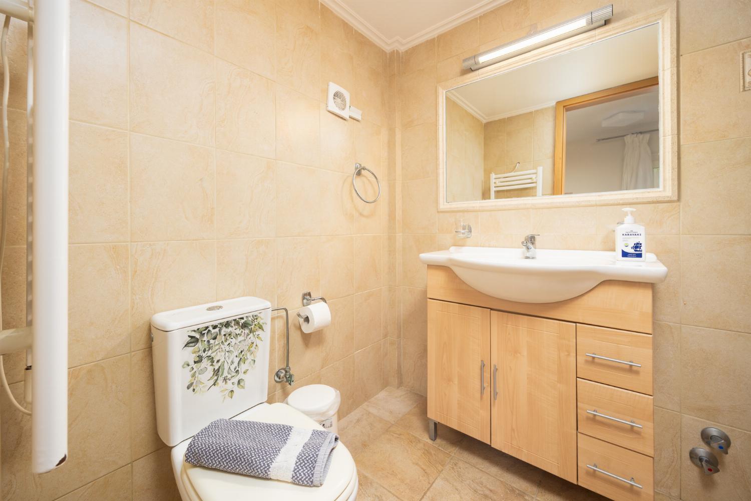 Family bathroom with bath and shower