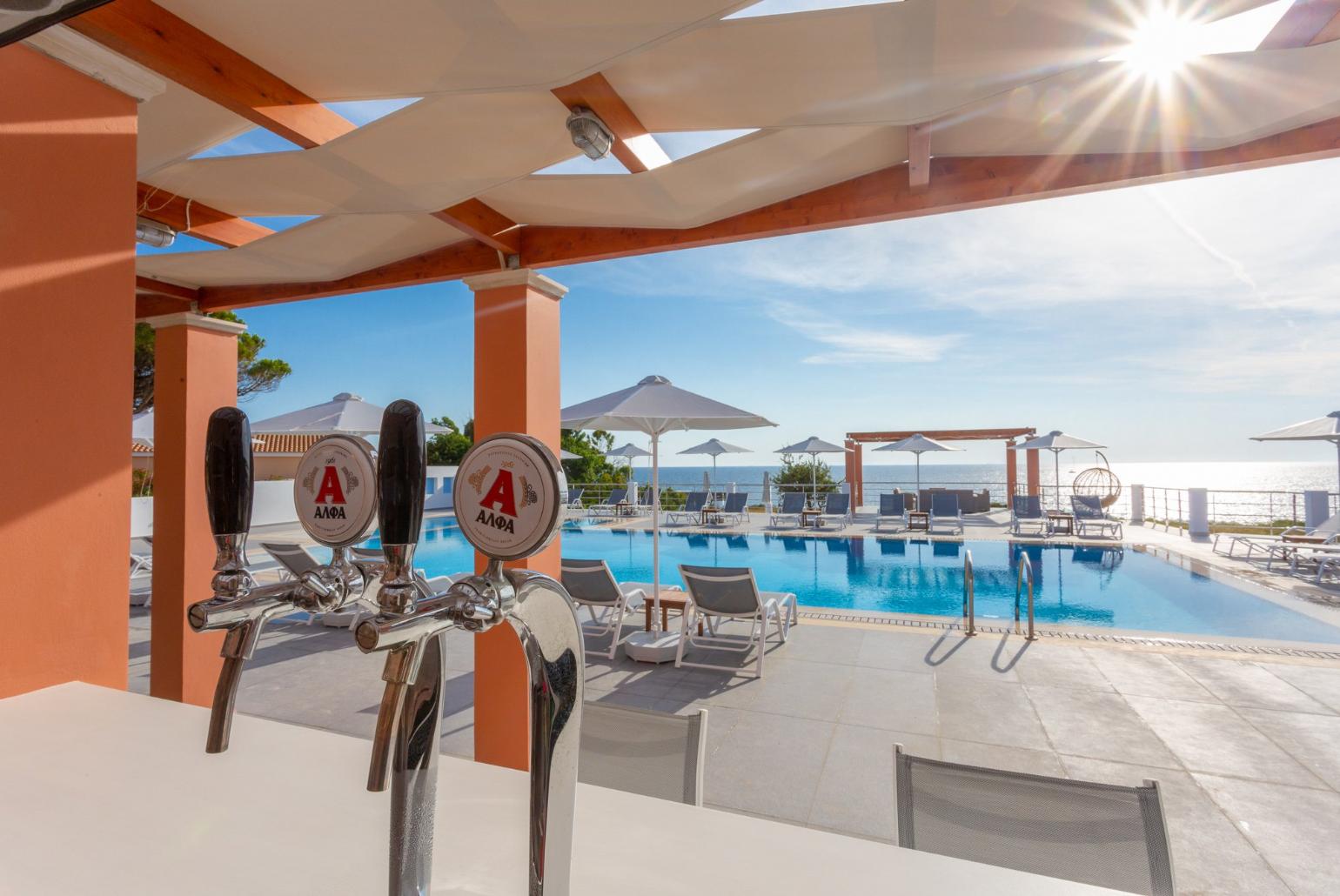 Poolside bar at Remetzo Village