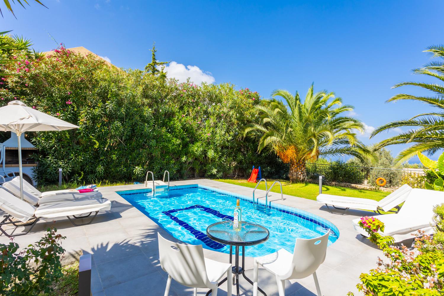 Private pool, terrace, and garden with sea views