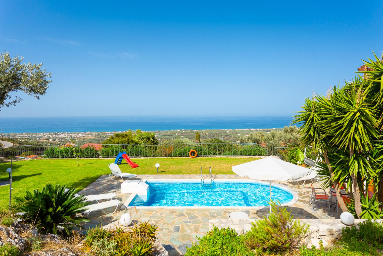 Private pool, terrace, and garden with panoramic sea views