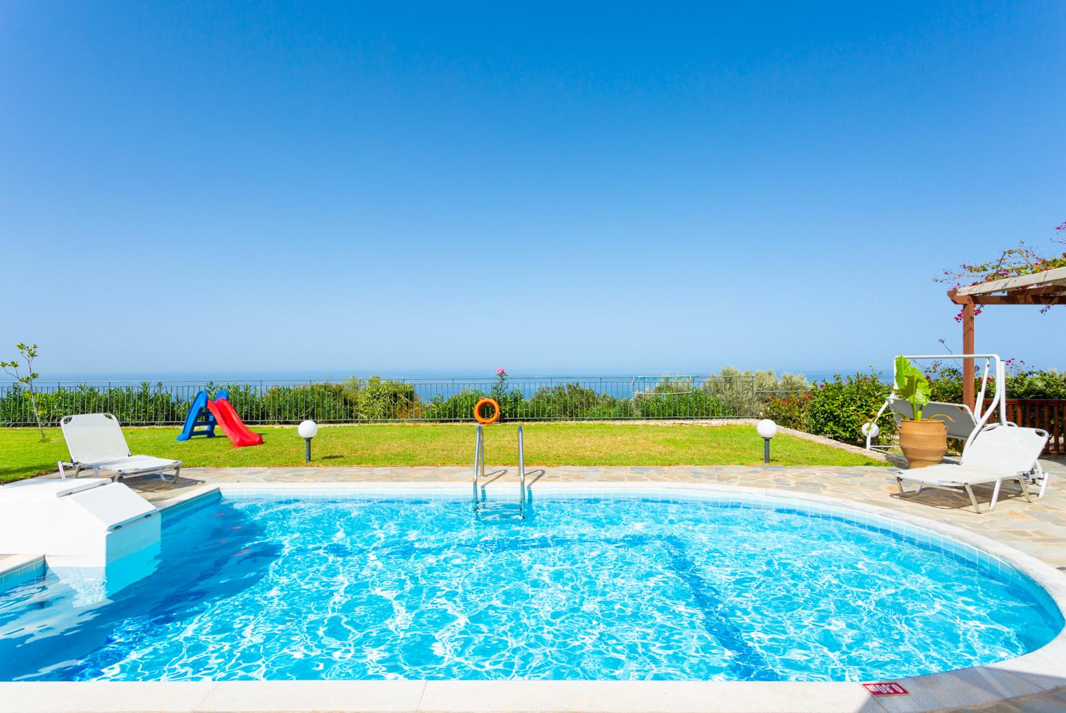 Private pool, terrace, and garden with panoramic sea views