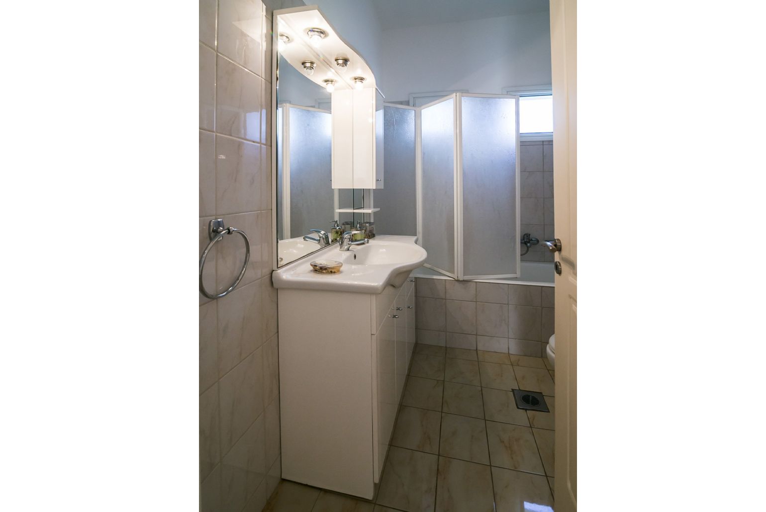Bathroom with bath and overhead shower