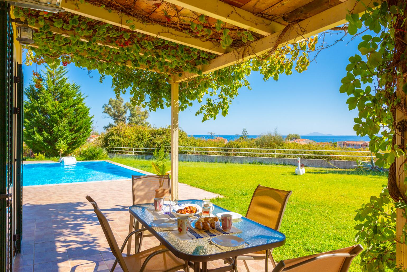 Sheltered terrace area with sea views