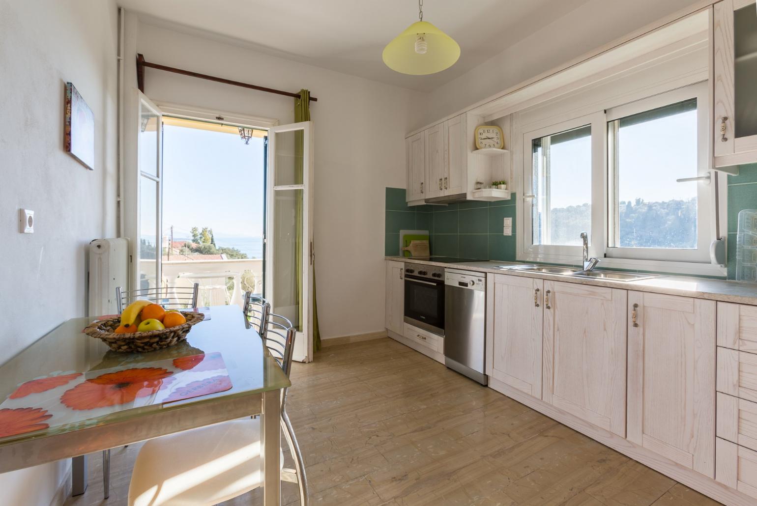  Equipped kitchen and dining area.